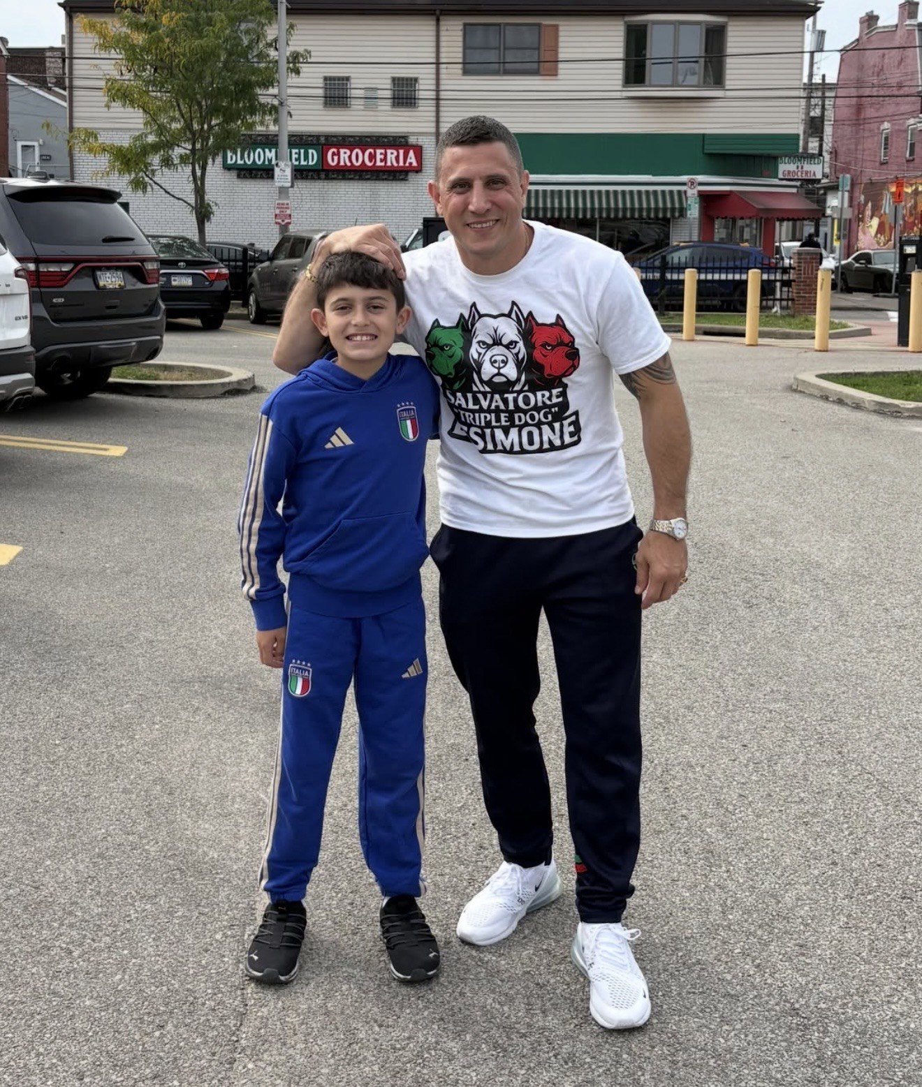 A supporter and young fan celebrate in Bloomfield.